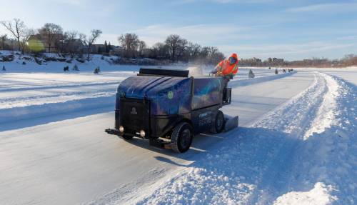 MIKE DEAL / FREE PRESS Joel Kosa drives the scraper “Zamboni” along the skating part of the trail.
2025.